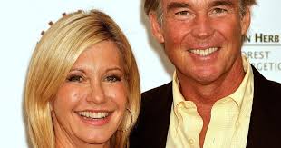 Dame Olivia Newton-John's husband: Our love transcends our understanding