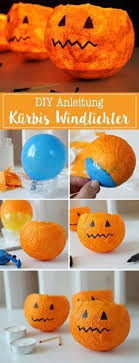 Diy Pumpkin Lanterns This Halloween Decoration Is Literally Child 039 S Play These Paper Mache Winds In 2020 With Images Halloween Diy Crafts Bricolage Halloween Diy Pumpkin