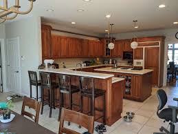 Search light cherry kitchen cabinets. How To Update A Kitchen With Wood Cabinets Without Painting Them Designed