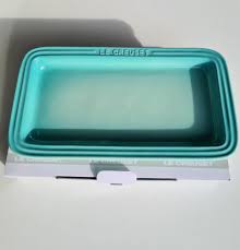 The redesigned handles of the 3 1/2 qt. Le Creuset Rectangular Plate Cool Mint Furniture Home Living Kitchenware Tableware Cookware Accessories On Carousell