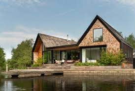 Wetbar in the basement with separate entrance. Architect Patrick Michell At Backwater His Waterside Holiday Home In Norfolk Innenarchitekt Moderne Hausarchitektur Haus Aussendesign
