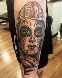 Dia de los muertos tattoo hand. Black Ink Dia De Los Muertos Girl Face Tattoo On Left Arm