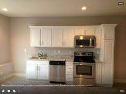 18 Fabulous Basement Apartment Ideas You Have To Know Small Basement Apartments Small Basement Kitchen Kitchen Remodel Small