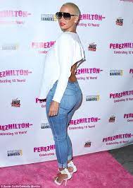 Amber Rose Shows Off Her Curvy Figure In Tight Fitting Denim Jeans Amber Rose White Long Sleeve Top Celebrities