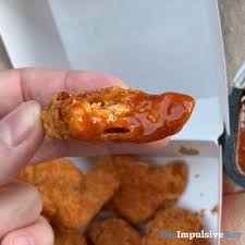 Many mcdonald's are back open for takeaway, delivery, and dining in. Review Mcdonald S Spicy Chicken Mcnuggets And Mighty Hot Sauce The Impulsive Buy