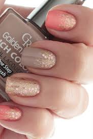 This look features minimal pink the coral hue is ideal for summer but you can also try the look with a light blue for a wonderful winter style. Coral Taupe And Gold Glitter Unique Nail Design Nail Designs For You