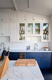Combined with white cabinets, blue quartz countertops will bring the vibe of the cool sky to your kitchen. Pin By Vicky Foster On Spaces Kitchens Blue Gray Kitchen Cabinets Buy Kitchen Cabinets Kitchen Design