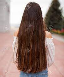 Back View Female Brunette Hair Young Beautiful Girl In Blue Jeans In Summer Park Stock Photo Picture And Royalty Free Image Image 130042495