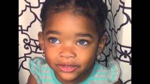Blonde hair and dark brown eyes. The Origin Of Black People With Blue Eyes Owlcation