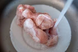 Run sealed container under hot water to release the frozen block into a. How To Defrost Chicken Safely Using Three Methods Quick Ways To Thaw Chicken