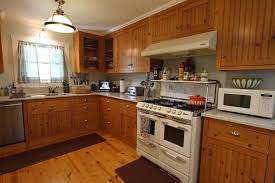 Furniture Very Inspiring Pine Kitchen Cabinets With Two Lighting And White Stove And Microwave Kitchen Inspiration Design Wood Kitchen Pine Kitchen