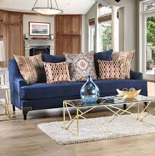 This navy living room is centered around an oversized sectional sofa, the perfect spot for the whole family to hang out. Sossy Contemporary Style Navy Sofa Decordells