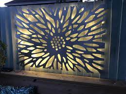 Decorative metal panels and screens, laser cut by experts, look amazing set in a garden or other outdoor landscape and no two are ever the same. Pin On Garden Wall Cover
