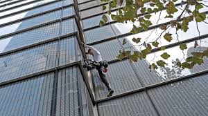 French climber alain robert, also sometimes known as spiderman, can be seen climbing various structures around the world. French Spiderman Clims London S Tallest Building Without Ropes