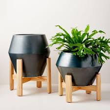 Последние твиты от west elm (@westelm). Ilya Turned Wood Planters Beluga Gray