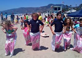 Super summer florida is a camp sponsored by the florida baptist convention, with funding provided by the cooperative program. Potato Sack Races At Aloha Beach Camp Summer Camp Zuma Beach Malibu Summer Day Camp Beach Camping Surf Camp