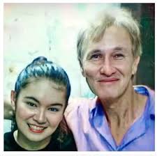 Redford White and his Wife Elena Cermeño with their two daughters.