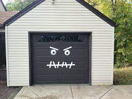 Pin By C H I Overhead Doors On Halloween Halloween Garage Halloween Garage Door Garage Door Christmas Decorations