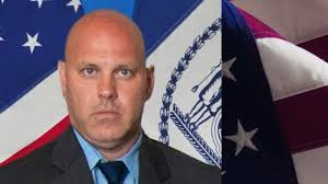 New York City detective killed in 'friendly fire' during armed robbery