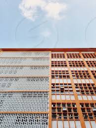 We are breezeway tech is an india's leading interactive web and mobile app development company, focused purposely on web designing, graphic design at present breezeway tech has client base in worldwide countries including reputed business houses, personalities, and outsourcing it companies. Architecture Building Structure Lines Grid Orange Blue Sky Clouds Looking Up City Scape Office Building Skyscraper Units Flats Screen Breeze Way Breeze Blocks Windows By Lauren Carey Photo Stock Snapwire