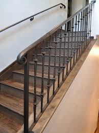 Wrought Iron Spindles Design Ideas Pictures Remodel And Decor Stair Railing Design Iron Stair Railing Iron Staircase
