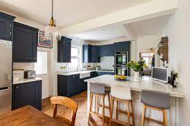 A peninsula is basically an island that's connected to a wall of the home. A Guide To Islands And Peninsulas Which One Is Right For Your Space Herringbone Kitchens