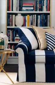 The Blue And White Bold Stripe Of Ralph Lauren Home S Bel Air Sofa Creates The Mood Of An Elegant Suite On The Riviera Home Striped Couch Striped Sofa