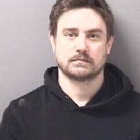 Mooresville man charged with killing wife