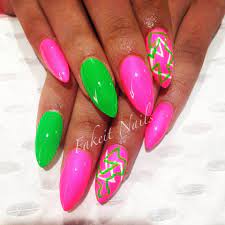 China mcclain painted her nails white and then added brightly colored stripes in hot pink, neon blue, and lime green. Pink Green Acrylic Nails With Bright Hand Painted Design By Fakeit Nails Sorority Nails Green Nails Green Acrylic Nails