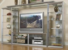 A metal frame offers durable support while the tempered glass tabletop is the perfect play to display and store various items. Contemporary Big Screen Wall Unit W Glass Storage Shelves