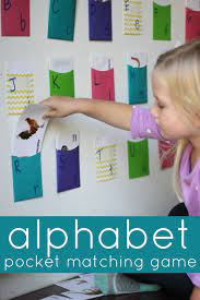 Here are over 200 material ideas that you can use for your collages, craft projects, or letter mats. Alphabet Pocket Matching Game Toddler Approved Alphabet Preschool Toddler Learning Activities Preschool Activities