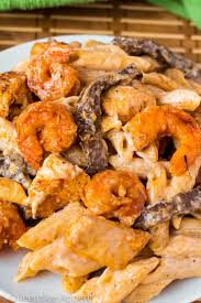I like to make sure the chicken is crispy , it adds extra flavor to the meal. Cajun Shrimp Chicken And Steak Alfredo Pasta Recipe Queenslee