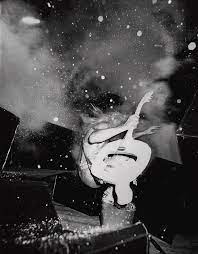 Colorful geometric background with dark grey mosaic design. White Punks On Dope By Michael Ochs Archives