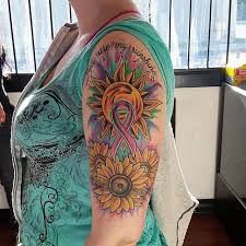 These ribbon tattoos that are worn by cancer patients and people who survived the disease as well as the any sometimes getting a cancer ribbon tattoo is just to make the person feel that they too have done 23. 130 Inspiring Breast Cancer Ribbon Tattoos June 2021
