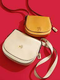 A must have handbag for any disney fan details glove calf leather inside zip and slip pockets flap closure, fabric lining outside slip pockets. What S Up Kl It S The Disney X Coach Collection Harper S Bazaar Malaysia