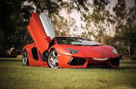 Download hd & 4k cars wallpapers,pictures,images,photos for desktop & mobile backgrounds in hd, 4k ultra hd, widescreen high quality resolutions. Red Lamborghini Aventador Coupe Nature Auto Grass Lamborghini Trees Hd Wallpaper Wallpaperbetter