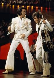 Love this picture captures Elvis and Charlie Hodge having fun on stage  previous such good friends 🤗🎸🎶🎼🎧💯🤗💖