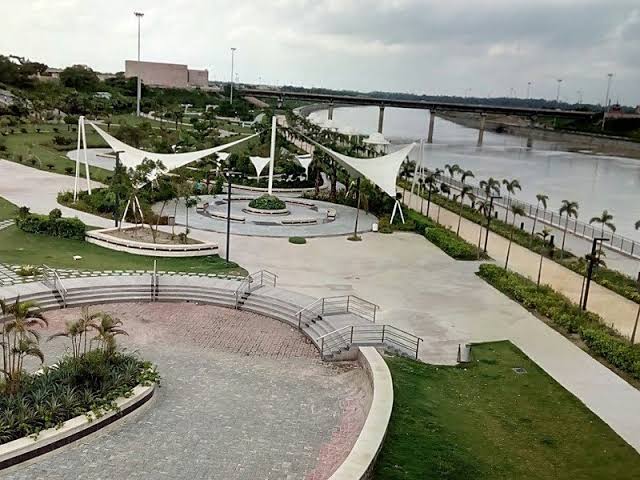 Riverfront promenade views, AI generated