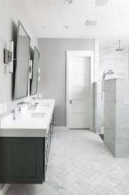 Light grey kitchen cabinets with dark countertops. Grey Color Palette Ideas Master Bath Herringbone Tile Bathroom White Marble Bathrooms White Quartz Bathroom
