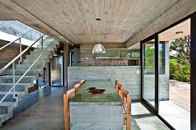 Industrial style house plan suburban exterior. Modern House Ushers In Industrial Style With Raw Concrete And Steel