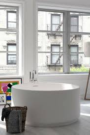 The ideavit collection of freestanding bathtubs in solid surface material offers bathtubs of various shapes and designs. Orbit Bathtub Circle Bathtub Round Bathtub Freestanding Bathtub Bathroom Design Luxury Free Standing Bath Tub Bathtub Design