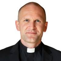 Travis Russell, S.J.