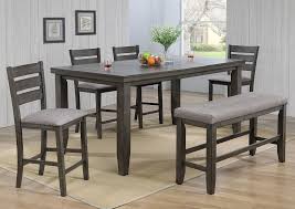 In kitchens designed for accessibility, at least some portion of the base cabinets is left open so that users can roll wheelchairs beneath the countertop while preparing food. Bardstown Counter Height Dining Table Set Gray Home Furniture Plus Bedding