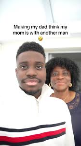 Black Guy with Fan Bothering His Mom