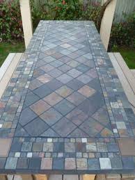 Turned An Old Solid Core Door Into A Slate Tiled Table Tile Top Tables Outdoor Flooring Tile Tables