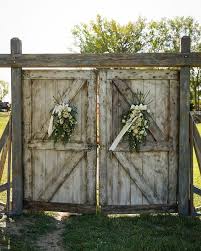 We Love These Barn Doors From Our Rental Collection That Make The Bridal Reveal And Walk Down The Isle Barn Wedding Decorations Barn Door Wedding Wedding Doors