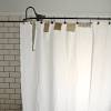 Freestanding tub with shower curtain. 1
