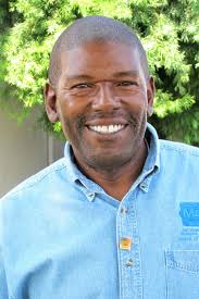 Good friends Megan, Rashaad and Talia enjoy the Harvest Ball