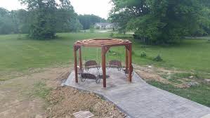 You can have a swing set around your fire pit. How To Build A Hexagonal Swing With Sunken Fire Pit Diy Projects For Everyone
