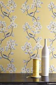 Love This Buttercup Yellow Song Birds Wallpaper By Vanessa Arbuthnott Perfect Wallpaper For A Bird Wallpaper Bedroom Feature Wall Wallpaper Wallpaper Bedroom